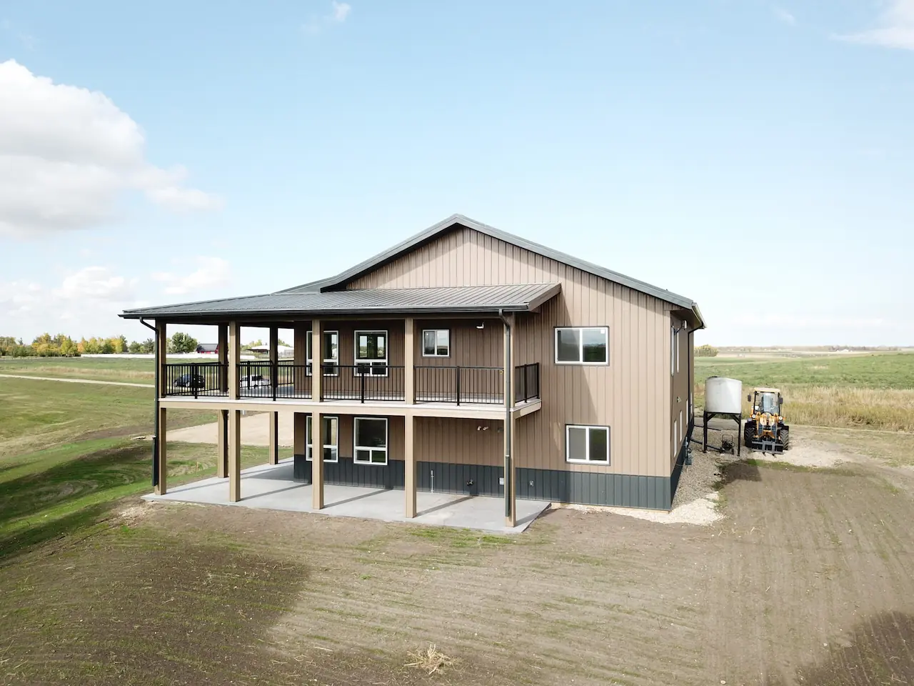 40' x 72' barndominium shop home (shouse) with two floors and a wrap around deck accessible from both floors