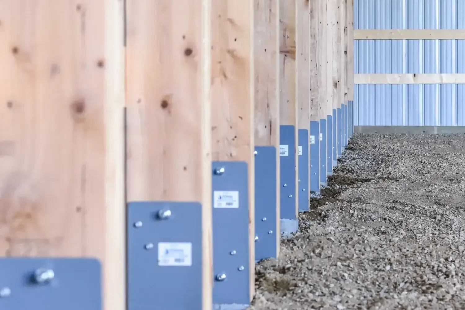 Close-up of engineered posts with Perma-Column that work as the sturdy, strong, durable foundation of a cold storage farm building.