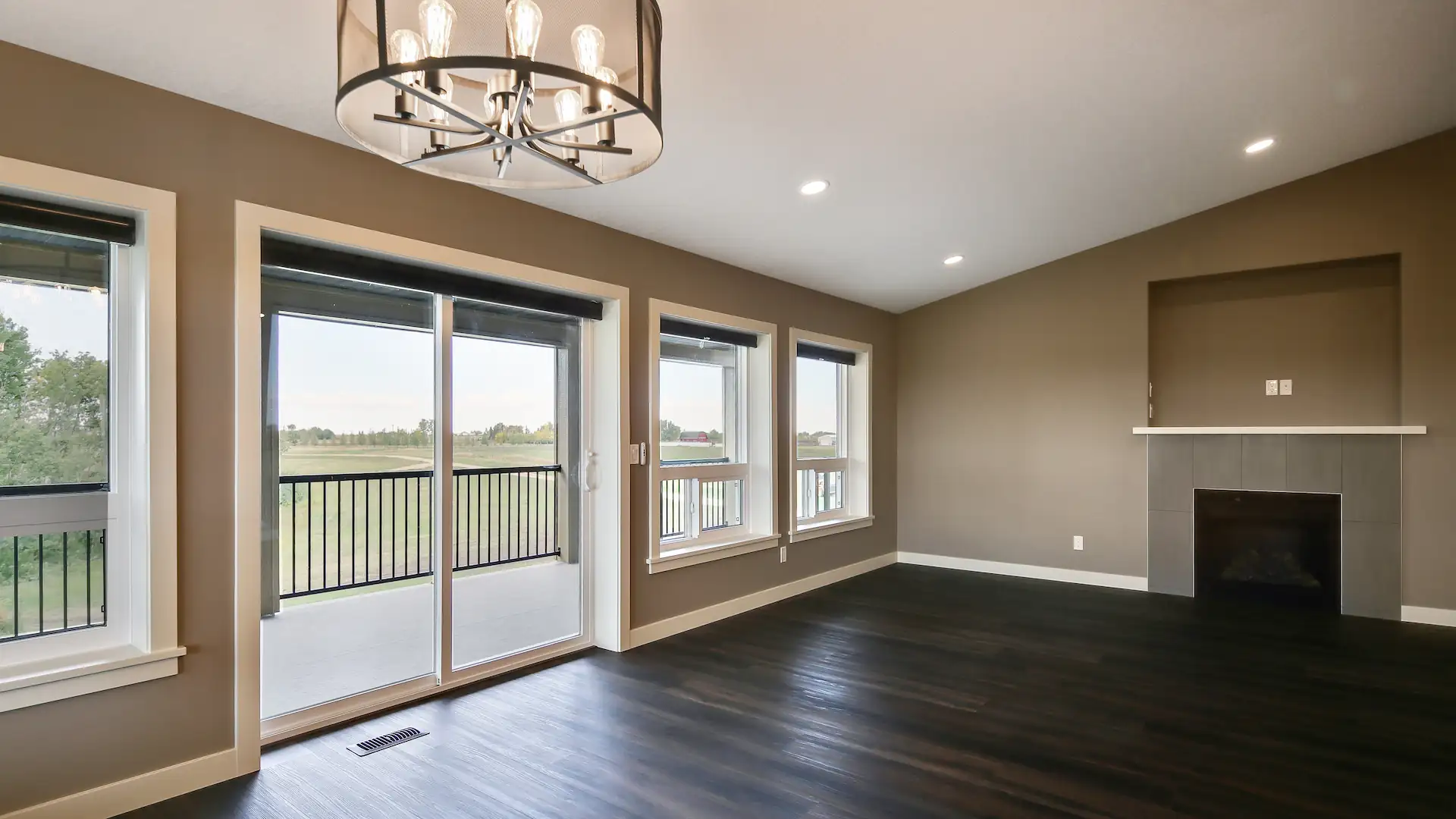Barndominium living room provides expansive views of the countryside