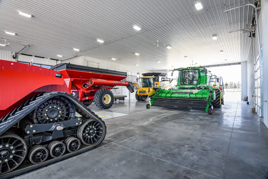 Equipment stored inside an insulated agricultural building