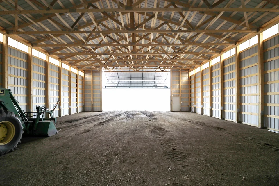 Cold storage building interior, with a tractor parked inside