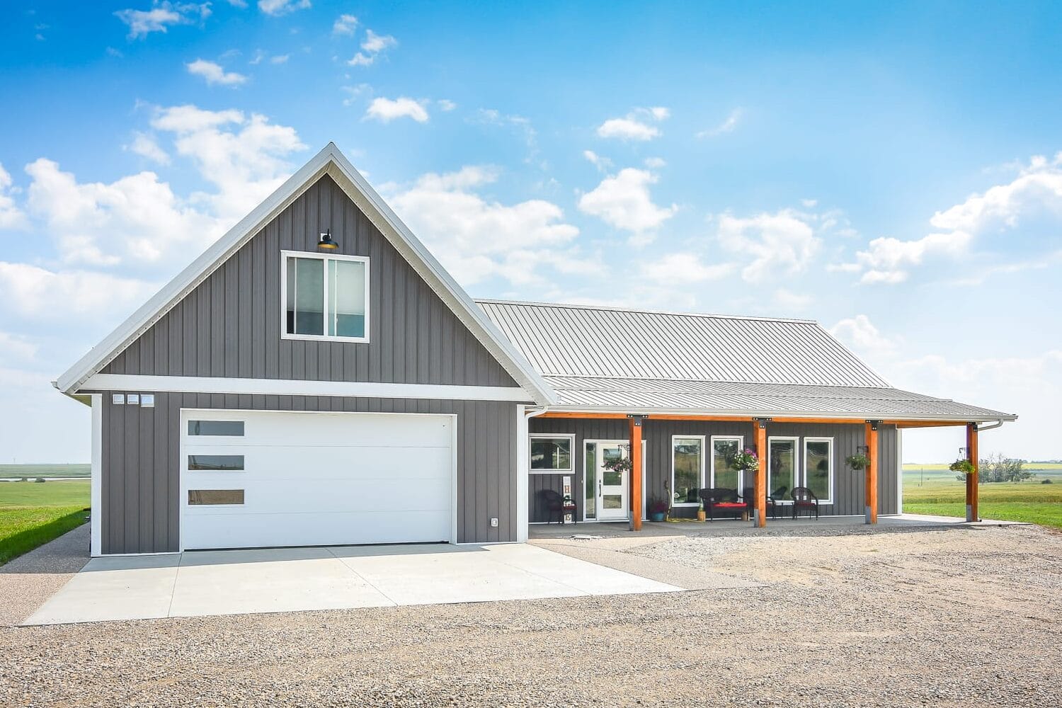 A post frame home features a loft above the garage for flexible living space for an office, guest room, or recreation.
