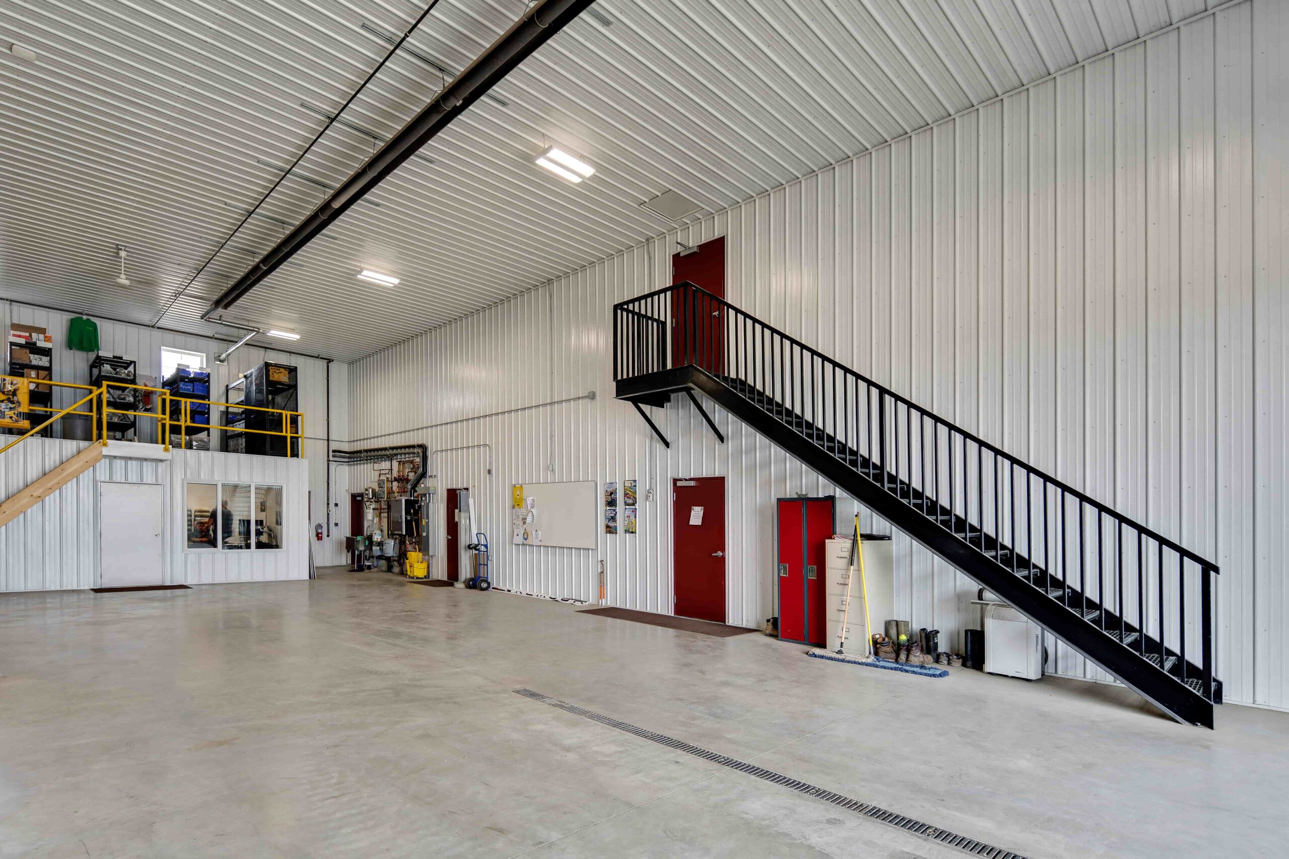 Finished interior of a post frame commercial warehouse