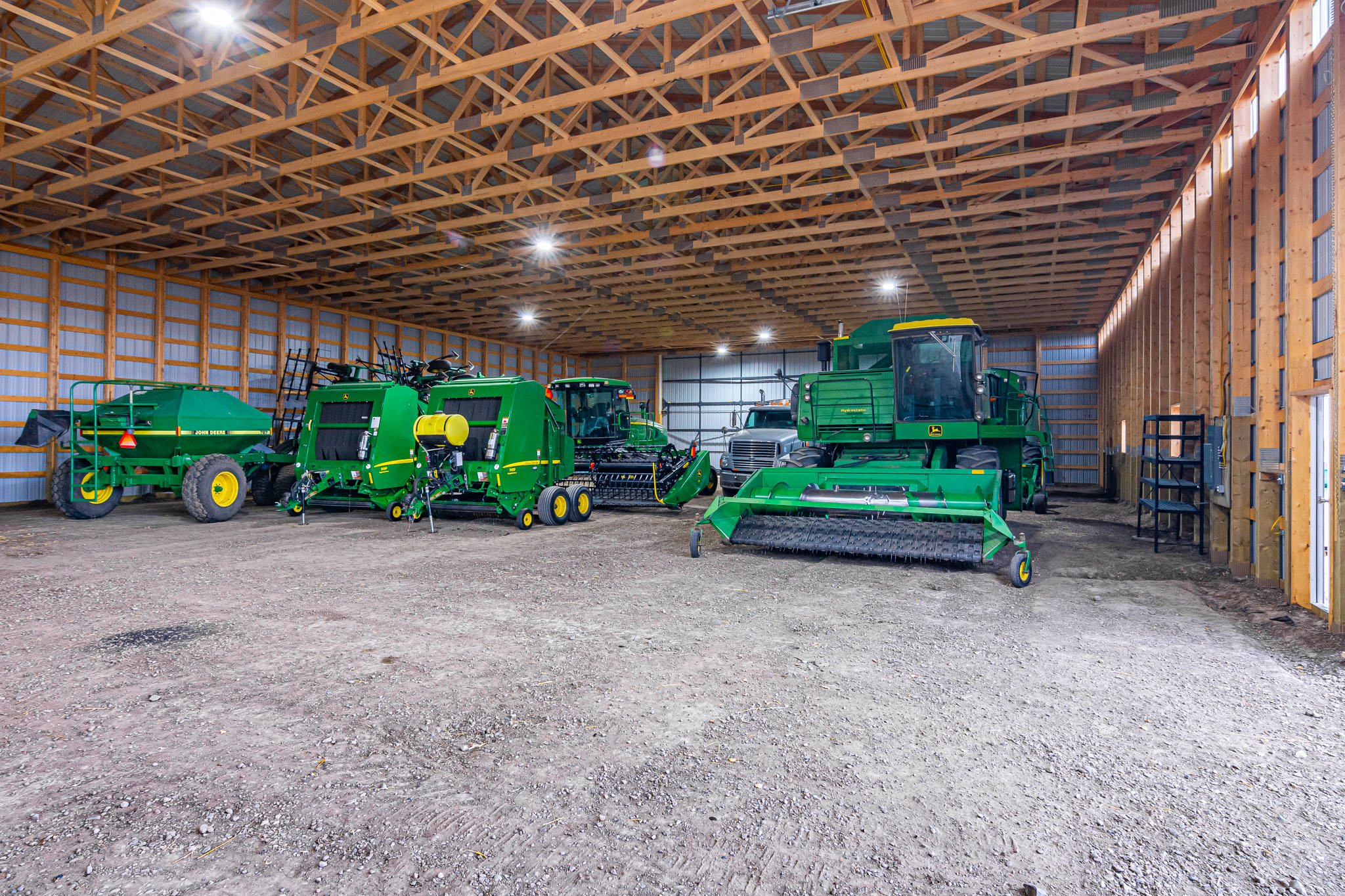 The interior of a post frame cold storage building shows posts spaced at 4' to create a strong structure