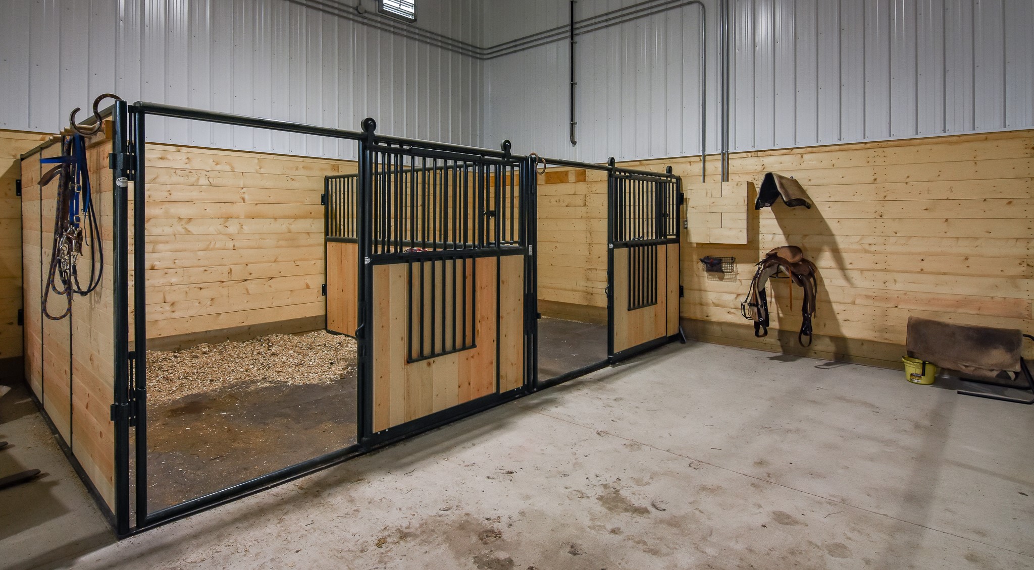 Spacious horse arena with attached living quarters for riders and staff