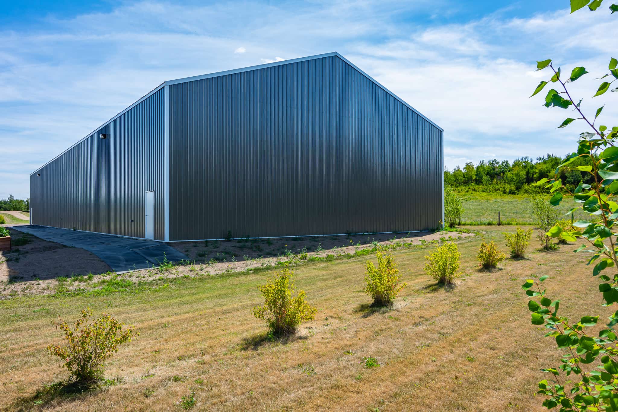 The exterior of a basic farm cold storage building.