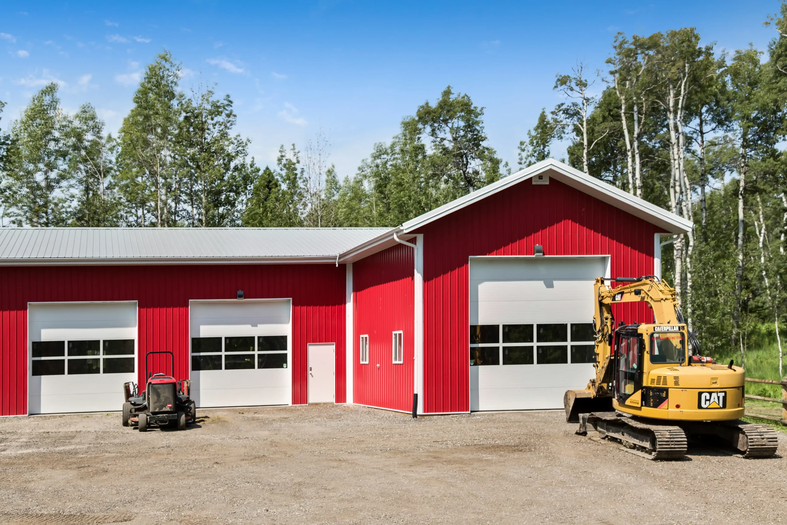 4 bay garage with overhead doors for acreage use.