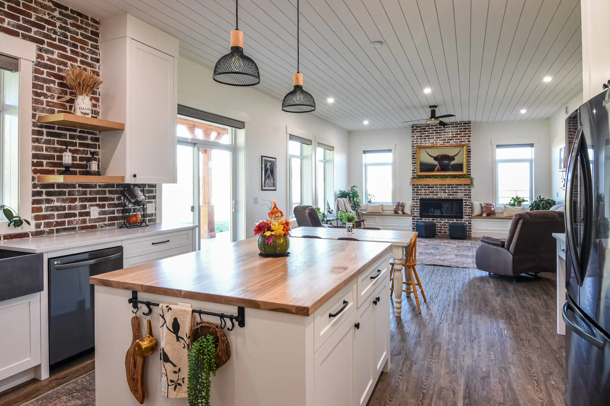 Open concept barndominium kitchen-living space