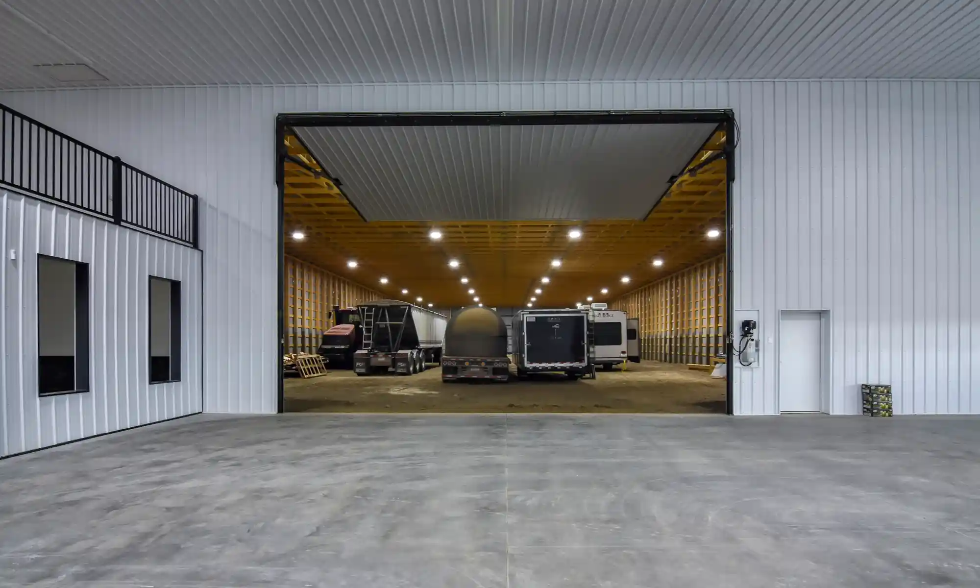 Interior of a clear-span farm shop creating a spacious interior by using modern pole building construction