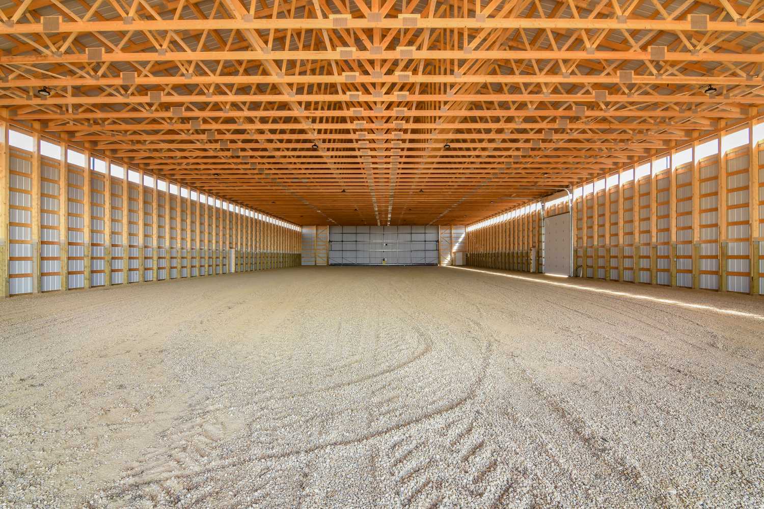 85' clear span interior on an agricultural storage building with Grade Guard sleeves on the posts